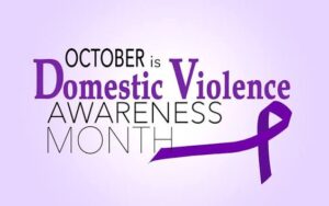 Domestic Violence Awareness Month image featuring the purple ribbon.