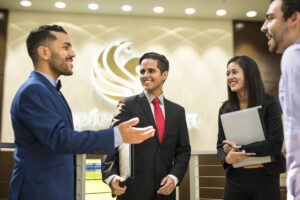 employees speaking with each other